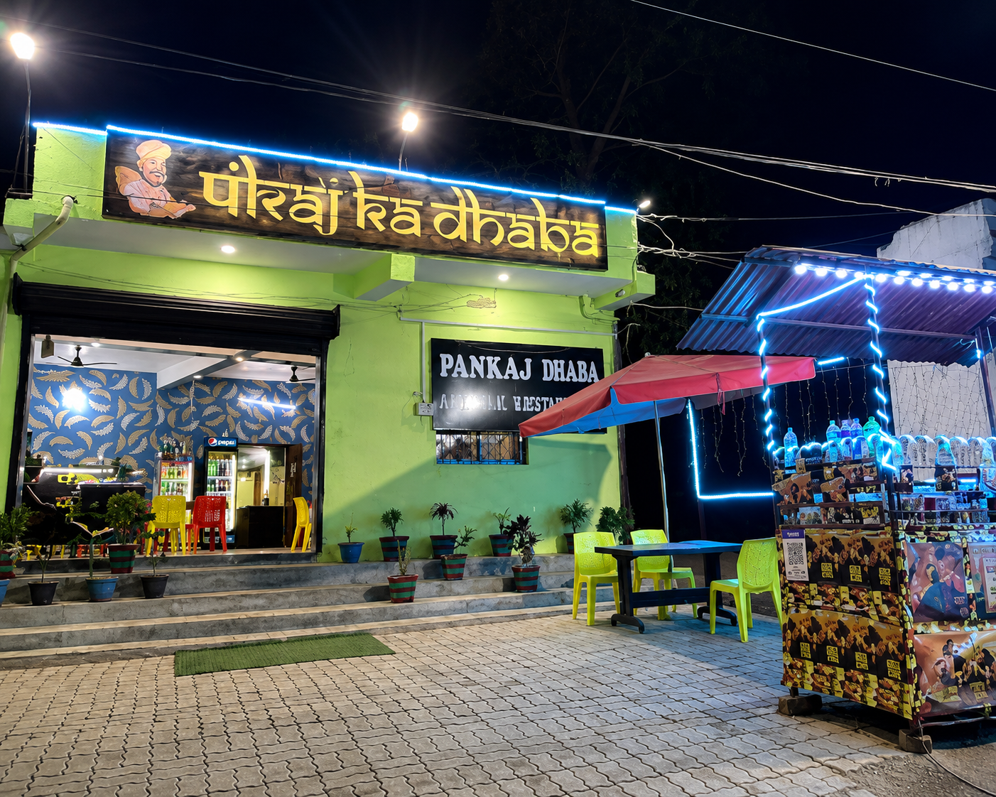 Pankaj Ka Dhaba — storefront at night